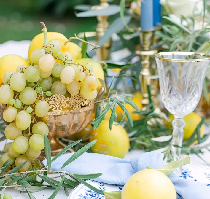 A table set with restraint, in pale linen and glass